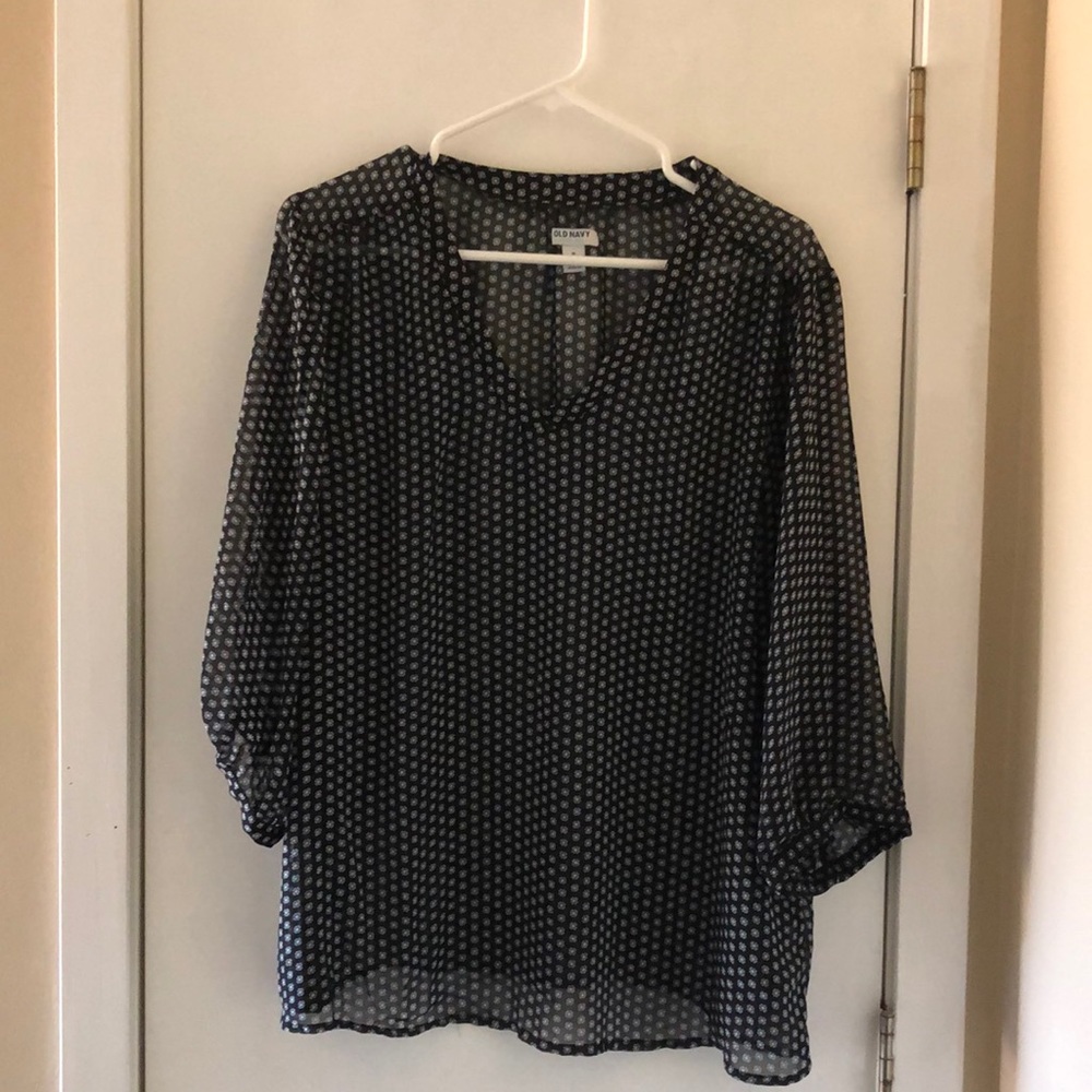 Sheer 3/4 sleeve top.